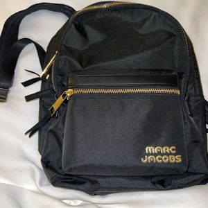 Marc Jacobs Backpack Small. Never been used before. Still has paper inside. $120